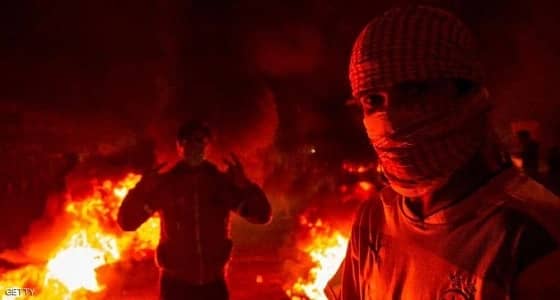 حرق مقار حزبية موالية لإيران في العراق