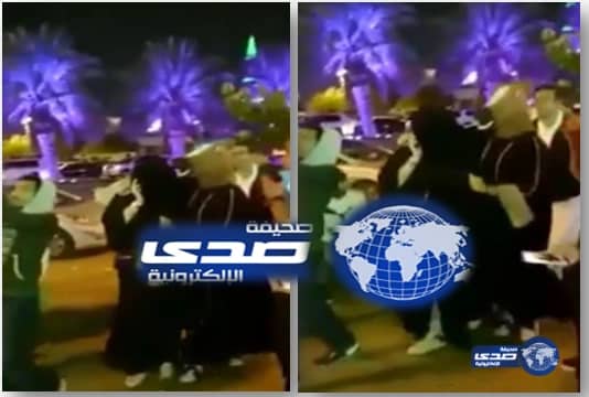 بالفيديو:فتاتين متنكرات يلتقطن "سيلفي" مع شبان في شارع التحلية بالرياض