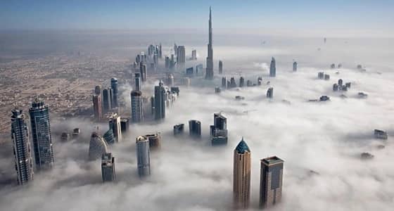 بالصور.. أبراج دبي وسط السحاب بعدسة ولي العهد