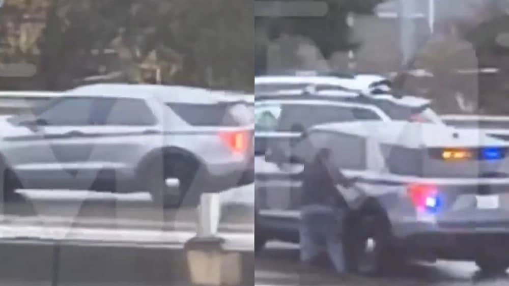 سرقة سيارة شرطة بعد الاعتداء على ضابطة وسط طريق مزدحم .. فيديو