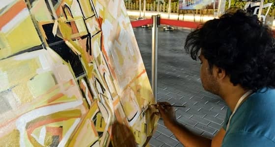 بالصور.. مهرجان الزهور يستضيف أشهر الخطاطين