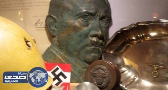 نظام تميم يفقد توازنه ويروج للنازية في قلب الدوحة برعاية القرضاوي