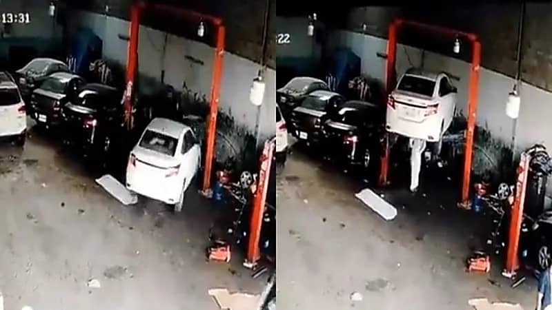 بالفيديو.. لحظة سقوط سيارة في إحدى الورش ونجاة شخص كان يتفقدها