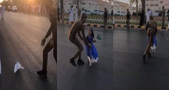 شاهد.. عسكري ينقذ حمامة وطفلة خلال استعراض أمني في اليوم الوطني