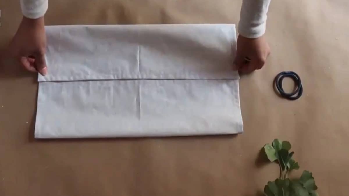 شاهد.. طريقة سهلة لصناعة الكمامة القماشية بأدوات منزلية