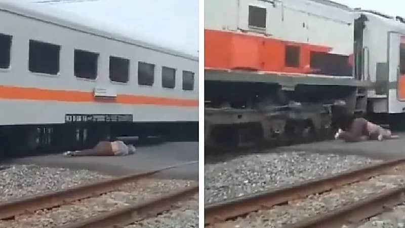مسن عنيد يحاول عبور سكة الحديد لحظة وصول القطار حتى سقط أرضا .. فيديو